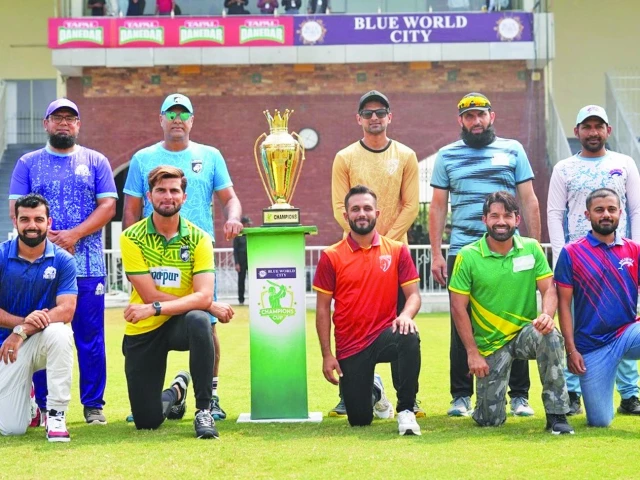 Pakistan Cricket League 2025 champion players posing with trophy at Blue World City ceremony